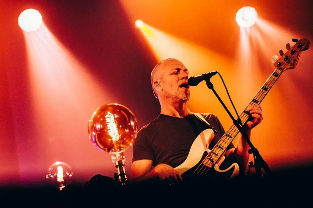 '1970' Avishai Cohen playing electric bass on stage and singing