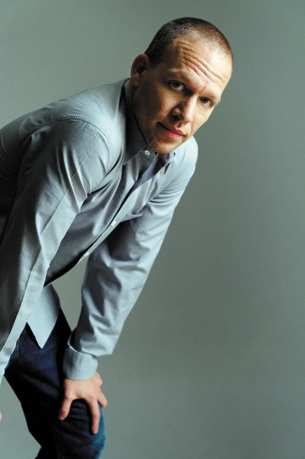 Avishai Cohen with hands on knees By Youri Lenquette