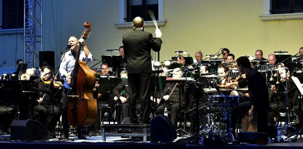 Avishai Cohen with conductor and orchestra