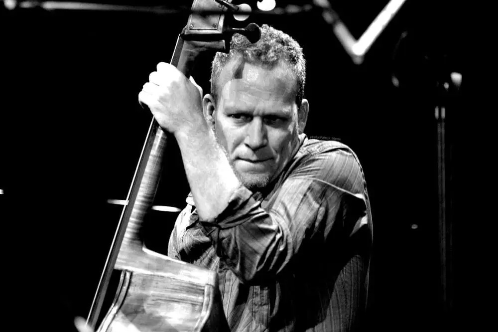 Avishai Cohen playing double bass by Patrick Marek