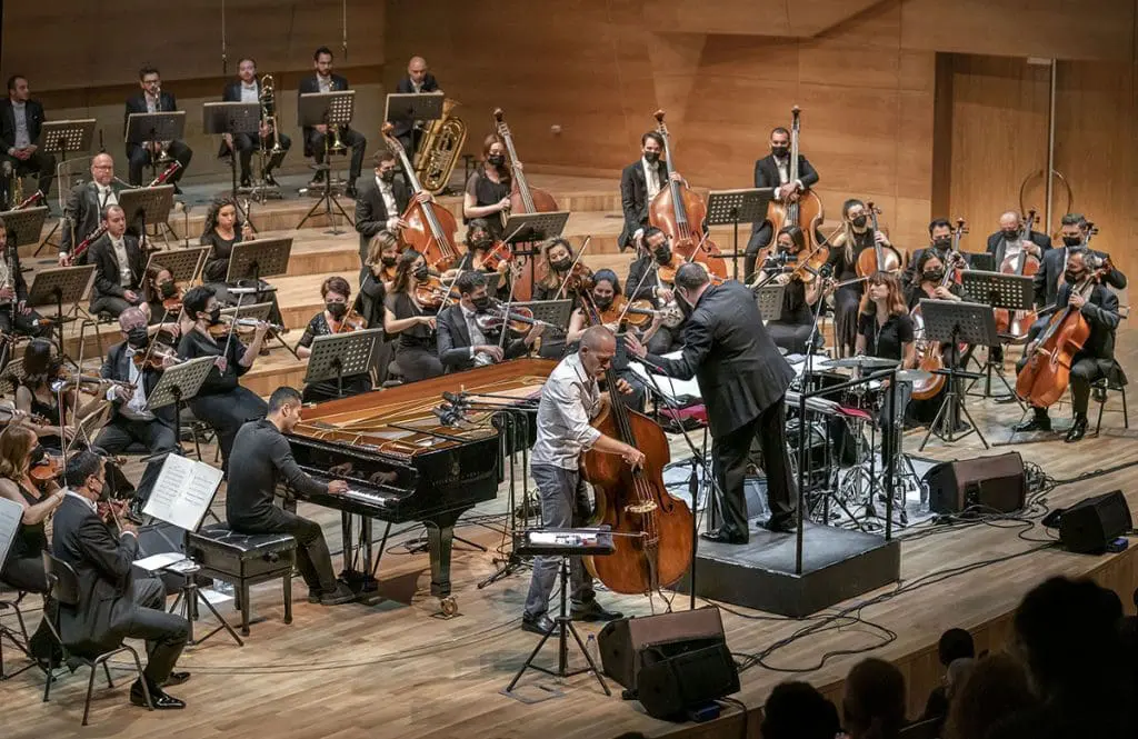 Orchestral show 2021 - Avishai Cohen with orchestra on stage - live
