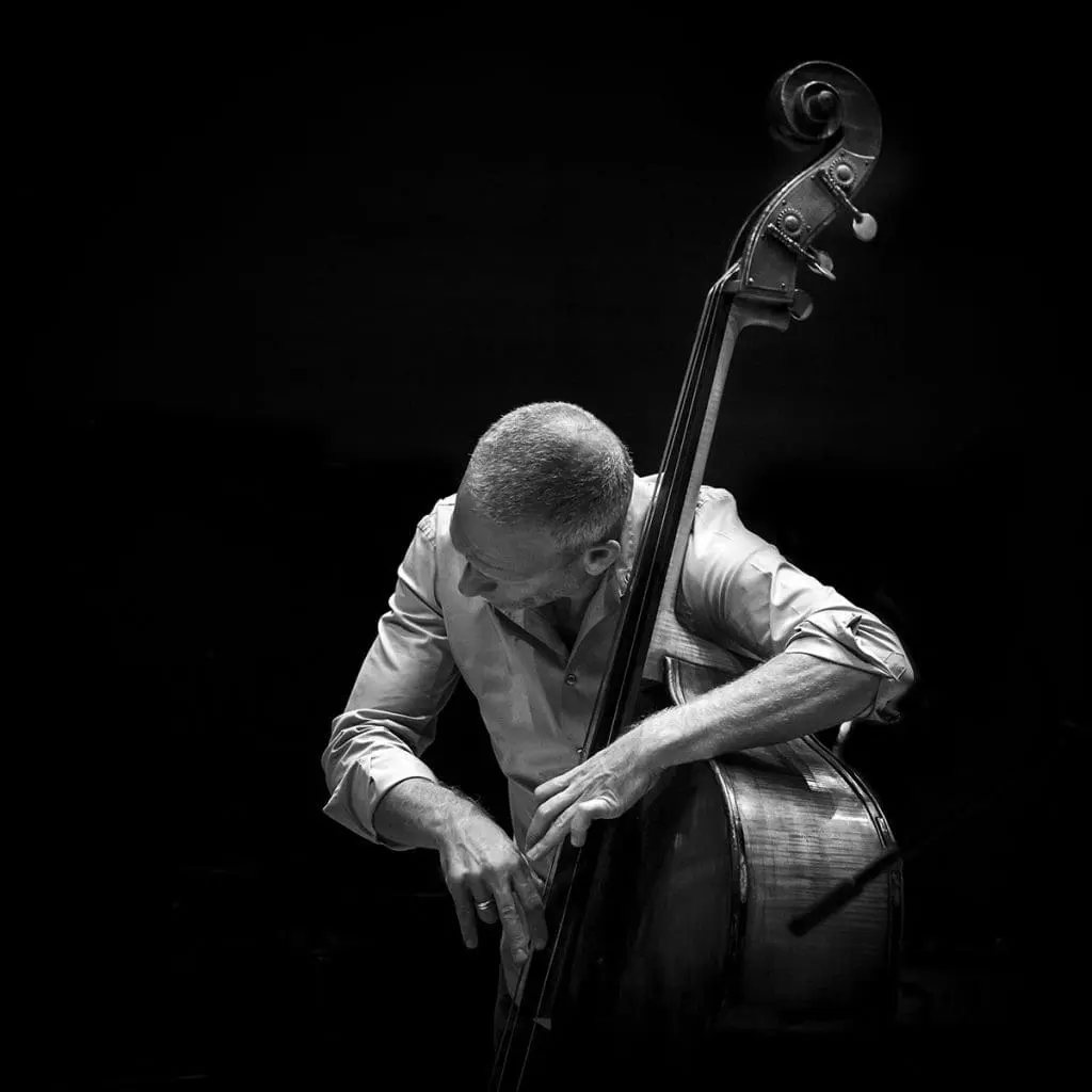 Trio Live Show 2021 - Avishai Cohen playing double bass (black and white)