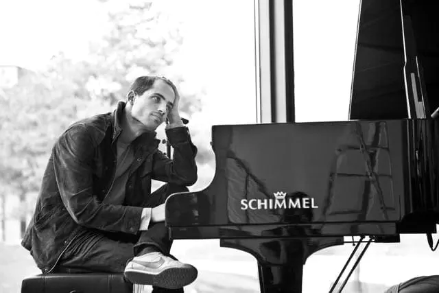 musician playing piano